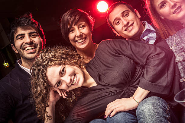 istock Friends enjoy at disco club 172373689