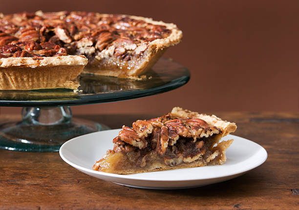 istock Baked Pecan Pie with One Slice Served on Dessert Plate 172373822