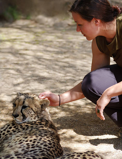 istock woman with cheetah 172374459