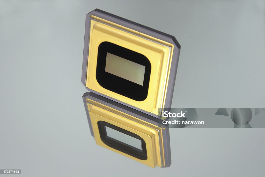 Digital Mirror Processor Digital Mirror Processor which is used to make projection TV. Semiconductor Stock Photo