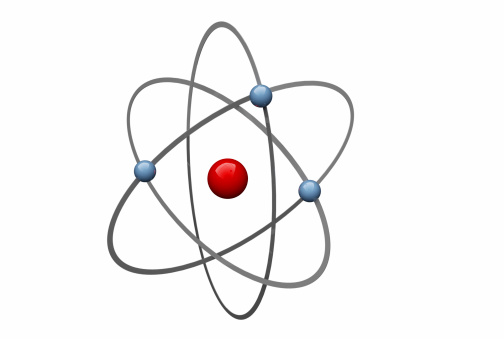 Concepts management peaceful atom. A man manipulates an atom on a dark background.