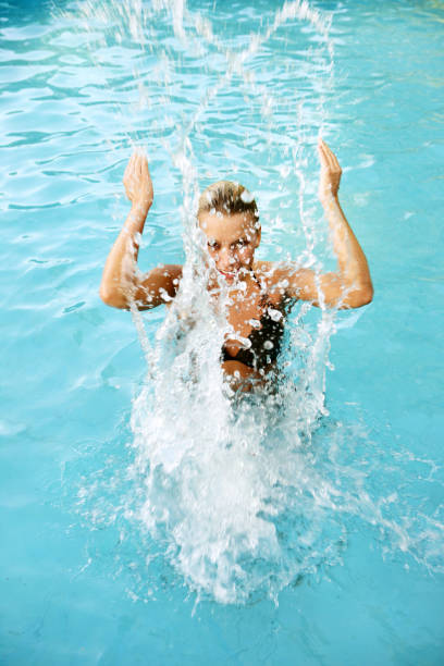 istock Woman in a swimming pool 172376097