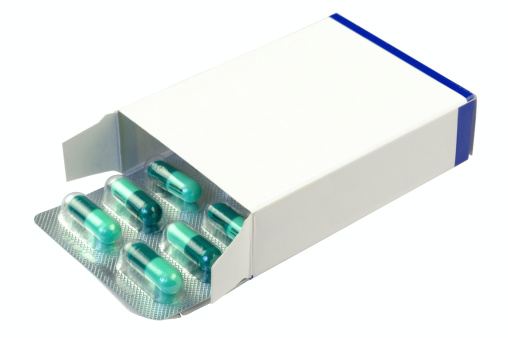 Capsules of medicine in box