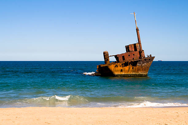 Ship wreck 2 Ship wreck on the beach. stockton california stock pictures, royalty-free photos & images