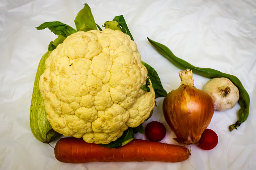 Close-up of fresh organic vegetables on a wooden table