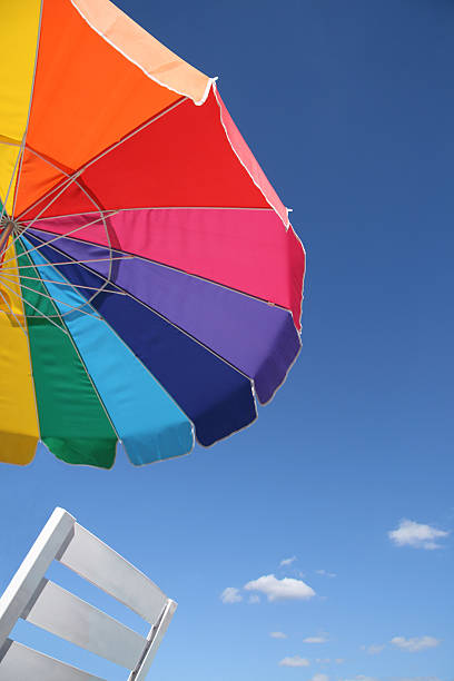 Colorful beach umbrella.  Summer afternoon in Indiana