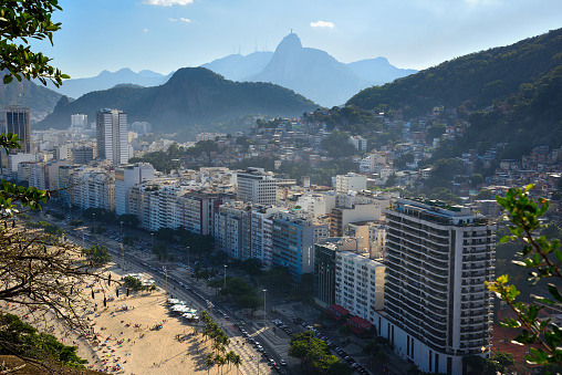 Leme Beach, residencial buildings and the favela in Morro da Babilônia seen from Forte Duque de Caxias in Rio de Janeiro, Brazil.