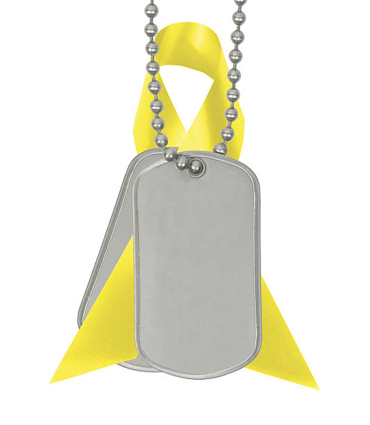 Awareness ribbon and dog tags Yellow Awareness ribbon and dog tags on a white background. amber alert ribbon stock pictures, royalty-free photos & images