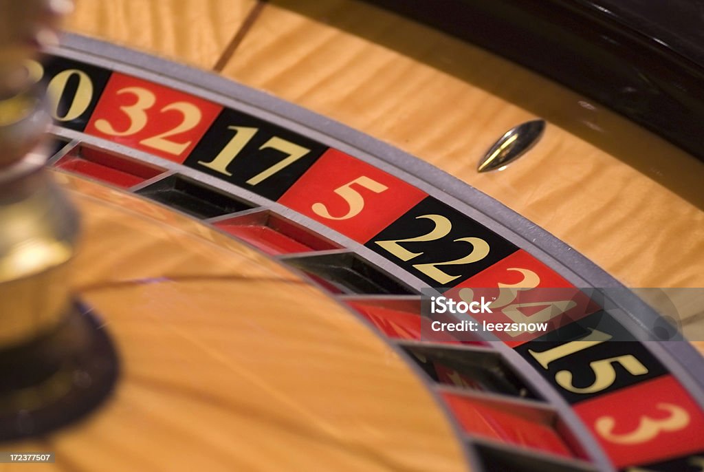Roulette Wheel Close-up of a roulette wheel in a casino.  Narrow dof with focus on number 22.  My other casino images: Chance Stock Photo