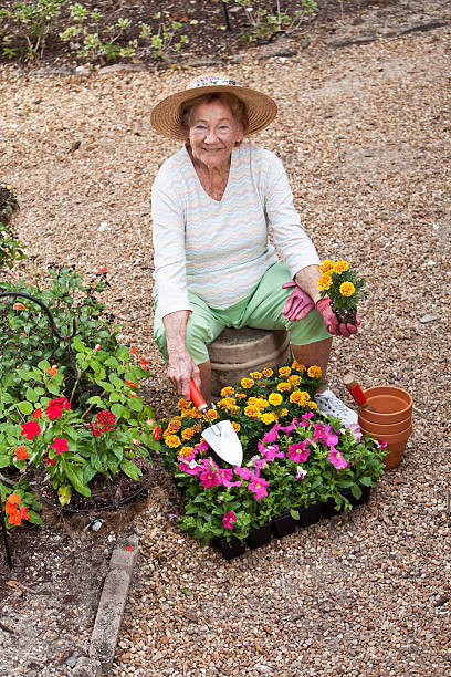 Elderly woman gardening