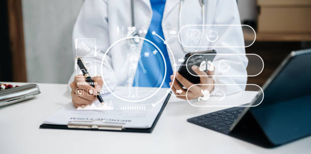 istock Medicine doctor using digital tablet and smartphone diagnose virtual electronic medical record on interface.Digital healthcare and network on virtual screen technology 1723779954