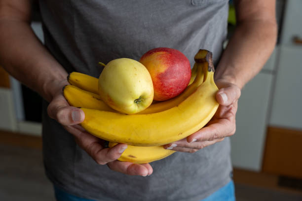 istock Close-up of bananas and apples 1723783676