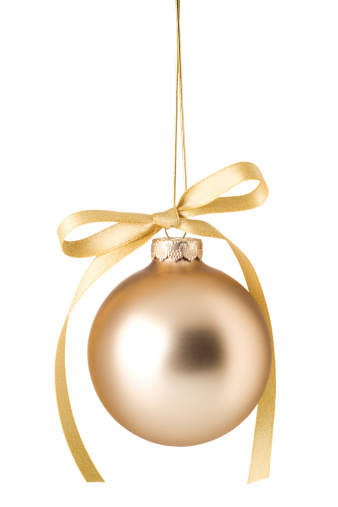 A hanging gold Christmas ornament tied with a bow.  Isolated on white with clipping path.