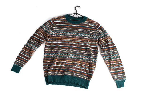 istock colored sweater with green, orange and brown colors. long sleeve patterned jumper isolated on white background 1723786522