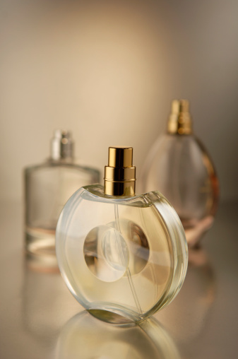 three perfume bottle with backlit glow