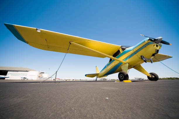 istock Full frame image of small airplane chained to the ground. 172379620