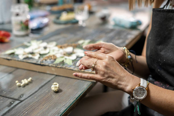 istock women hand is working for relief canvas focus on foreground relief is background horizontal art still 1723796379