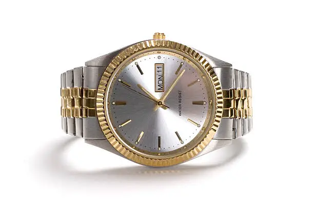 A picture of a gold watch.more like this: