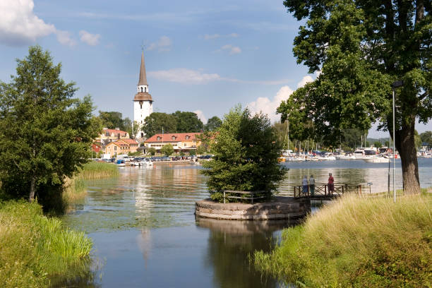 Lakeside "View across Lake Malaren looking at the town of Mariefred, Sodermanland, Sweden." mariefred stock pictures, royalty-free photos & images