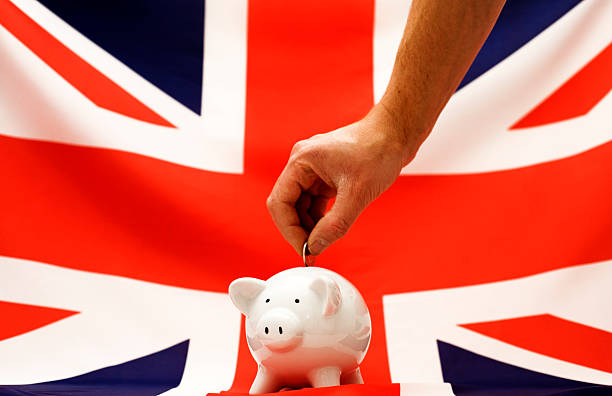 economia britânico - british flag currency banking uk - fotografias e filmes do acervo