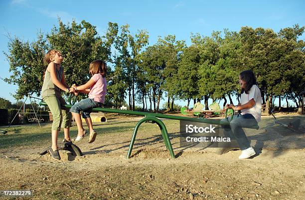 Seesaw Stock Photo - Download Image Now - Seesaw, Child, Spring Ride