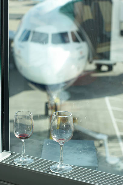 istock Wine glasses before boarding aircraft 172382710
