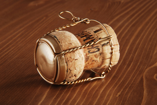 Champagne cork on wood.