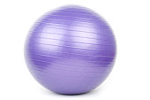 Purple Pilates ball set on a white background