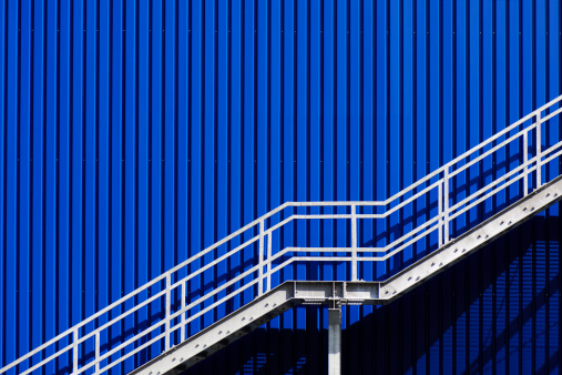 Stairs against a blue wall