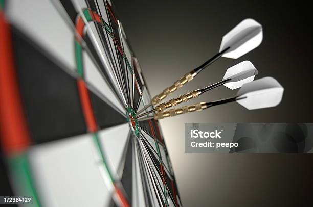 Close Up Of Darts In Bullseye Stock Photo - Download Image Now - Accuracy, Achievement, Aiming