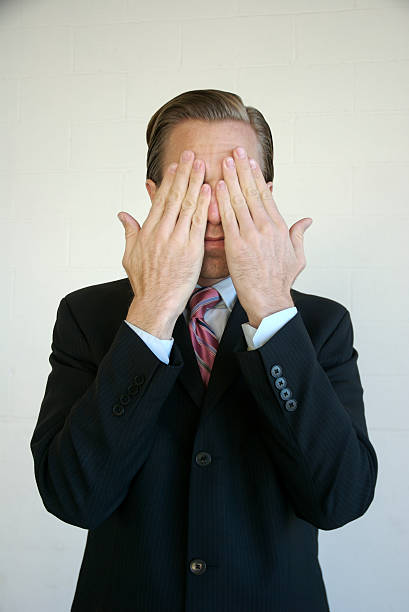 istock See No Evil Businessman Covering Eyes 172384272