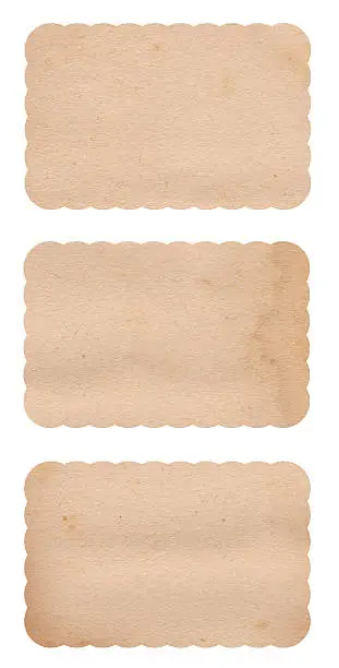 Image of 3 empty/blank vintage paper labels with scalloped edges isolated against a white background. Great retro design element. See more images like this one in my portfolio.