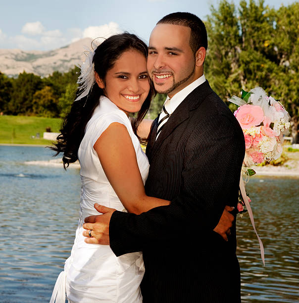 istock Weddings:  Bride and Groom outside. Lake, mountains. Summer. Marriage. 172384846