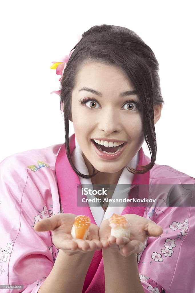 Feliz mulher segurando Sushi em suas mãos - Foto de stock de Adulto royalty-free