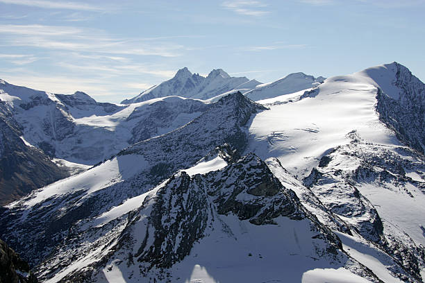 istock Photograph of snow covered mountain range 172385698