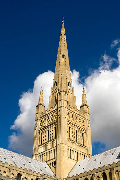 istock Norwich Cathedral spire with background clouds 172386102