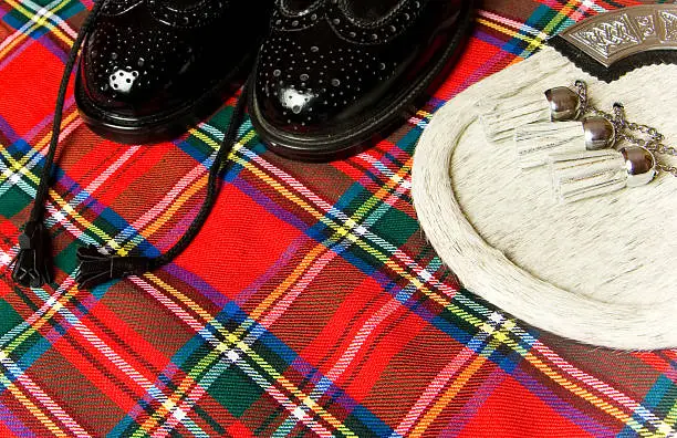 Scottish kilt, shoes and sporron.