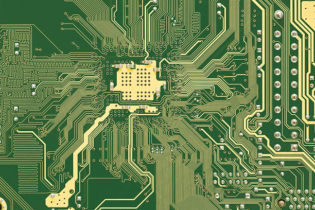 Circuit Board , Green and Gold Green and Gold circuit board - mother board transistor stock pictures, royalty-free photos & images