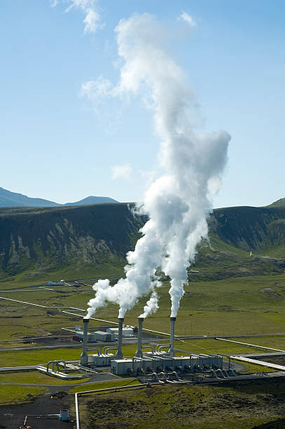 istock Steaming geothermal power plant chimneys 172386485