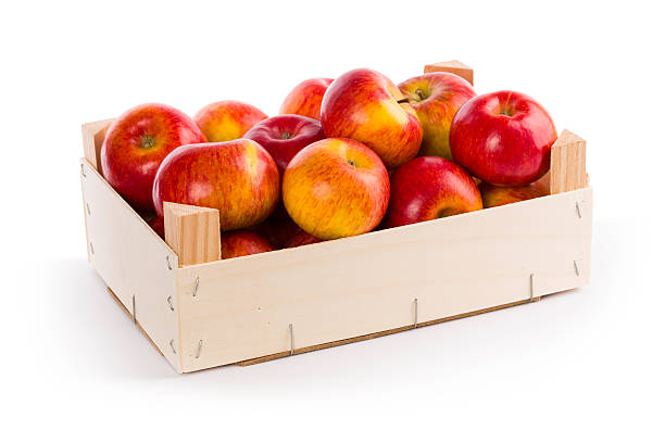 istock red-yellow apples in a small box 172386498