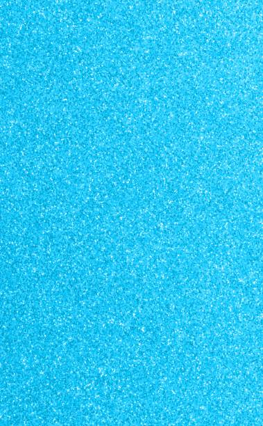 istock CYAN Light shimmering Glitterd backdrop with lights and reflections 1723866403