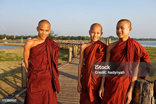 Buddhist Monks Crossing U Bein Bridge Stock Photo - Download Image Now - Adult, Amarapura, Ancient