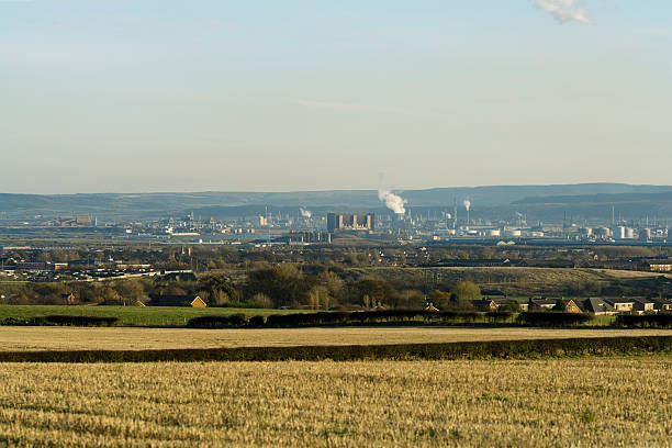 Teeside Industrial Landscape "Panoramic View over Teeside, UK.Teeside docks (left), Hartlepool Nuclear Power Station (centre)and various chemical plants (centre and right) can be seen.See also Redcar Steelworks:" middlesbrough stock pictures, royalty-free photos & images