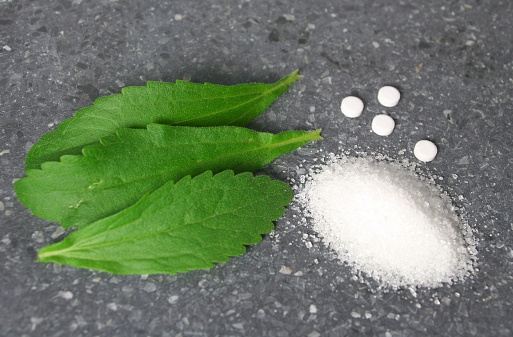 closeup of stevia, saccharine and sugar