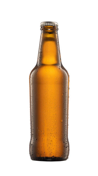 istock Brown beer bottle with drops isolated on white background 1723876744