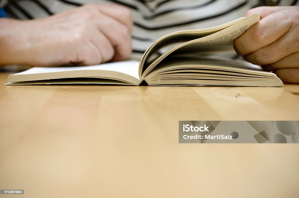 Senior woman reading a book Publisher Stock Photo