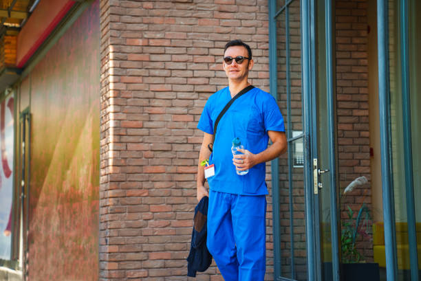 istock Healthcare worker going out of a building 1723880346