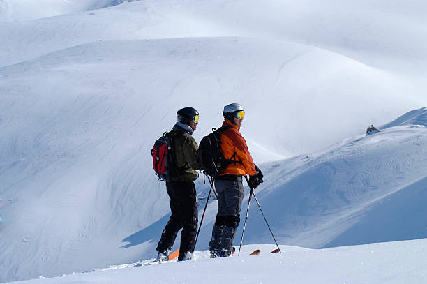 istock Skiers in fresh snow 172388848