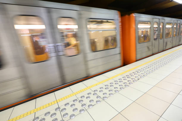 istock Subway car running fast with blurred motion affect in the station 1723897345