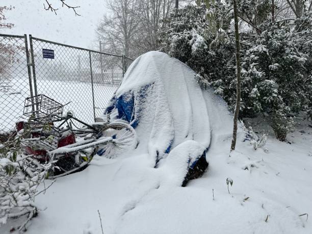 istock Homeless tent in winter covered in snow 1723899062